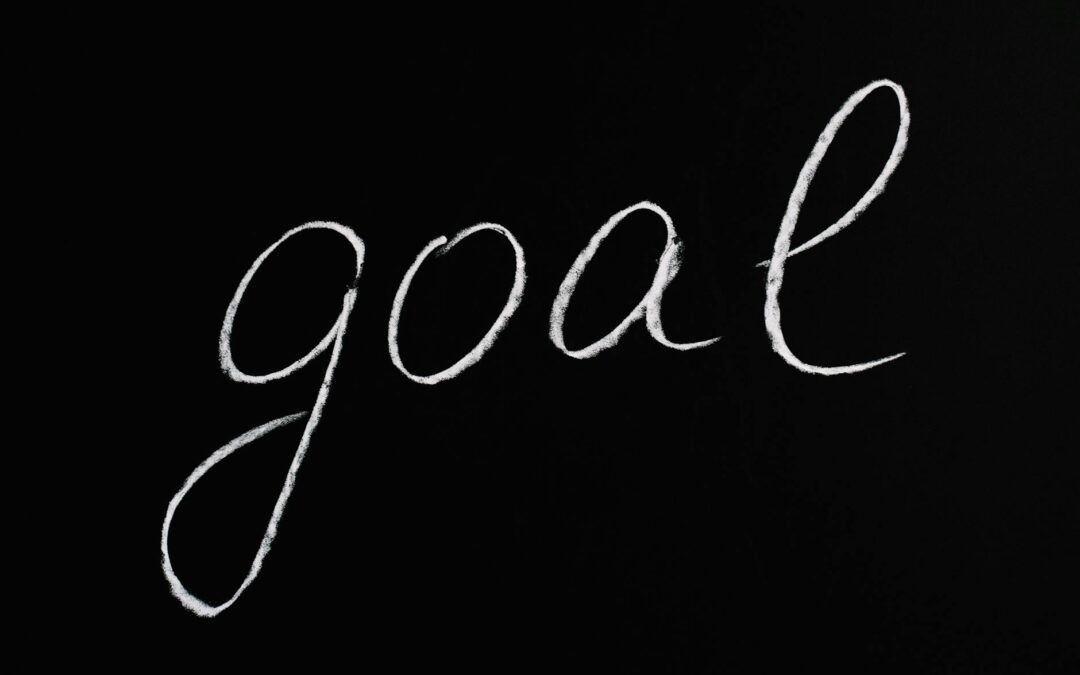 goal lettering text on black background